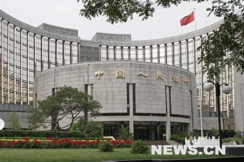 The photo shows headquarter of the People's Bank of China, the central bank. China is to raise one-year deposit and loan interest rates by 27 basis points to 4.14 percent and by 18 basis points to 7.47 percent respectively from Dec. 21, the central bank said Thursday. 