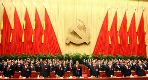 Hu Jintao (C), Jiang Zemin (4th R Front), Wu Bangguo (4th L Front), Wen Jiabao (3rd R Front), Jia Qinglin (3rd L Front), Zeng Qinghong (2nd R Front), Wu Guanzheng (2nd L Front), Li Changchun (1st R Front) and Luo Gan (1st L Front) attend the closing session of the 17th National Congress of the Communist Party of China (CPC) at the Great Hall of the People in Beijing, capital of China, Oct. 21, 2007. The seven-day 17th CPC National Congress closed here on Sunday.